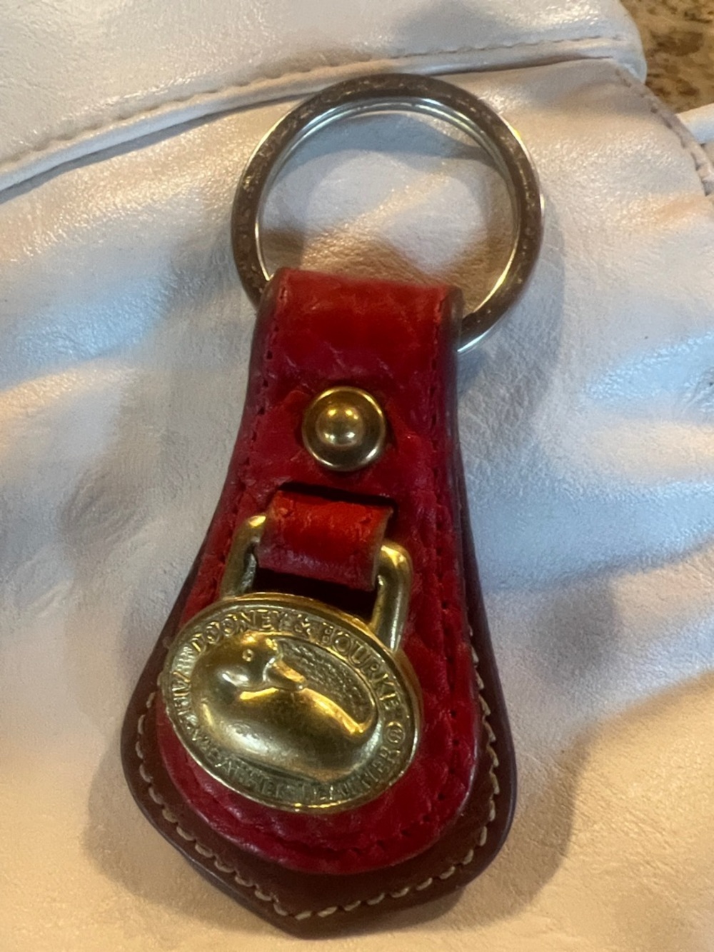 Dooney & Bourke Red Leather Key Fob with Brass Duck Medallion